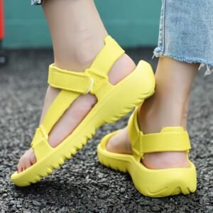 woman turned to her back wearing yellow sandals