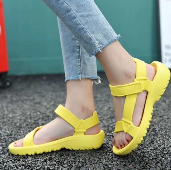 woman walking in yellow sandals