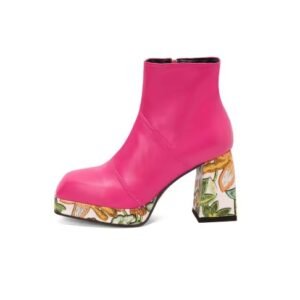 pink colorful Chelsea boots on the white background