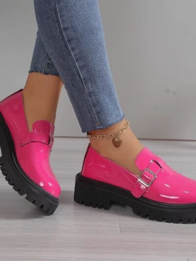 woman wearing colorful loafers for women on the grey floor