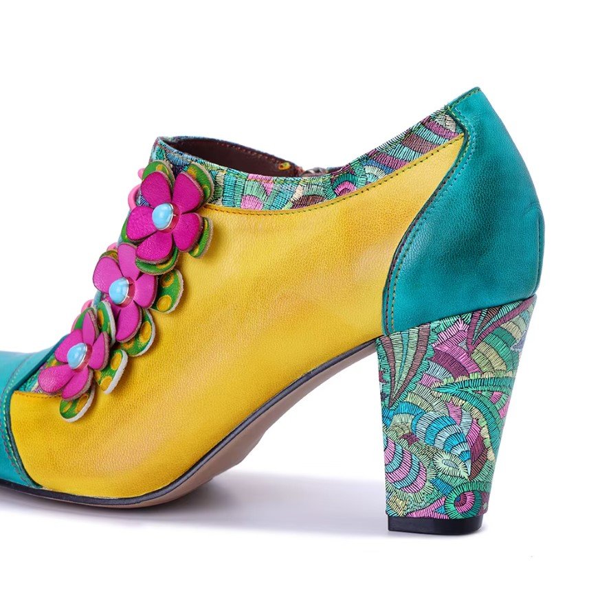 heel of colorful vintage boots on the white background