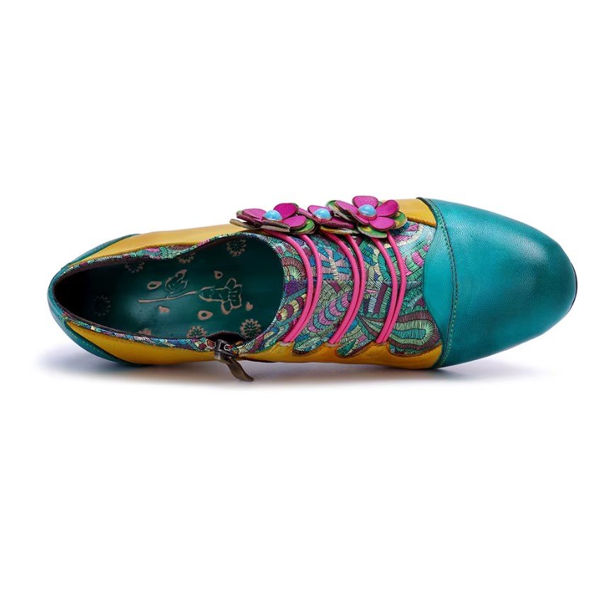 inner material of colorful vintage boots on the white background