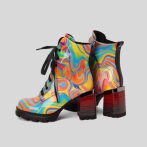 back view of colorful winter boots on the white background