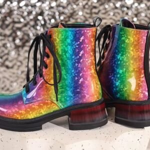 back view of multicolored boots on the shiny grey background