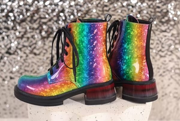 back view of multicolored boots on the shiny grey background