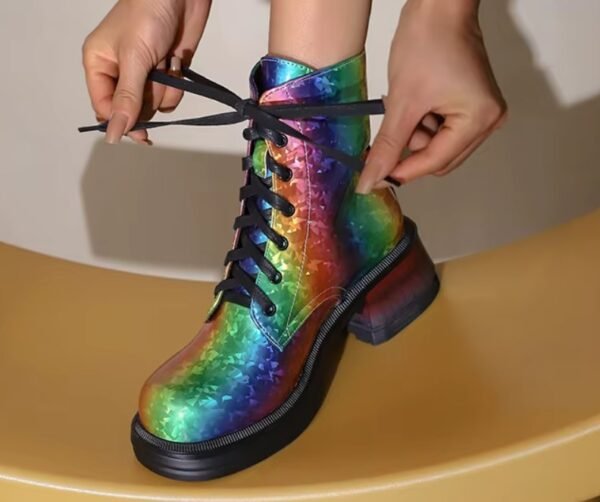 woman lacing multicolored boots