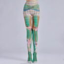 woman wearing sweet colorful tights in a grey room