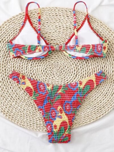 back view of color block bikini on a beige carpet