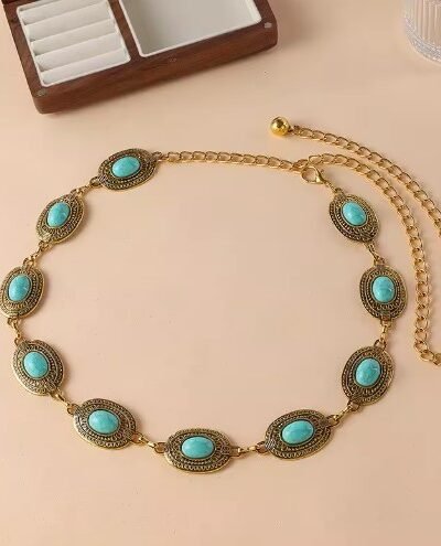 front view of colorful chain belt on the beige background