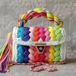 colorful crochet bag on the grey background