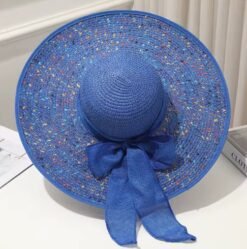 colorful hat with a large brim lying on a white surface