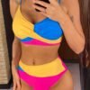 woman wearing colorful high-waisted bikini