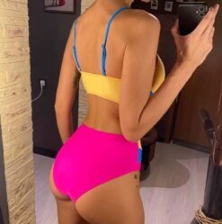 woman turned to her back wearing colorful high-waisted bikini