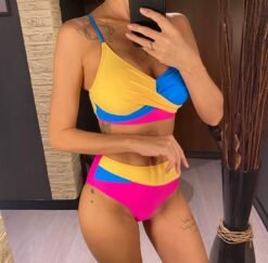 woman turned to her side wearing high-waisted bikini