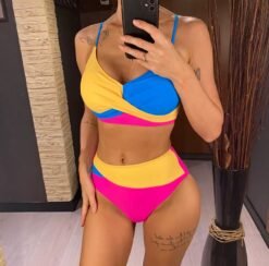 woman wearing high-waisted bikini and holding a black phone