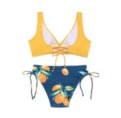 back view of colorful lemon bikini on the white background