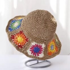 side view of colorful straw hat on the white background