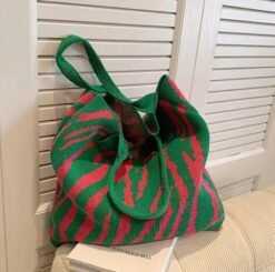 colorful tote bag lying in a white room