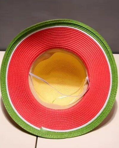 back view of colorful watermelon hat on the beige table