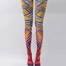 woman wearing colorful zebra tights on the grey background