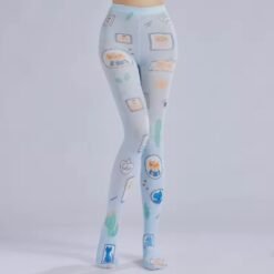 woman wearing fun tights on the grey background