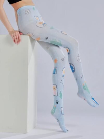 woman turned to her side and sitting on a white elevation, she is wearing fun tights and a black top