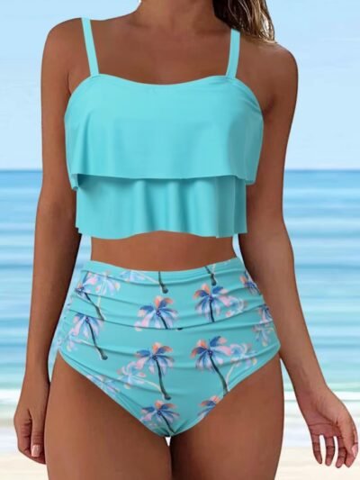 woman wearing light blue bikini, the beach in the background