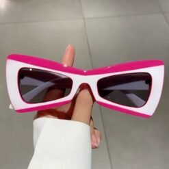 woman holding modern colorful sunglasses