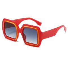 side view of oversized colorful sunglasses on the white background