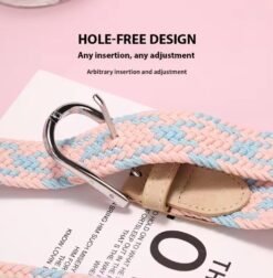 silver buckle of pastel colorful belt lying on a white newspaper