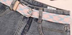 pastel colorful belt on the grey denim pants