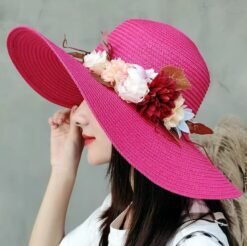 woman wearing pink floral hat