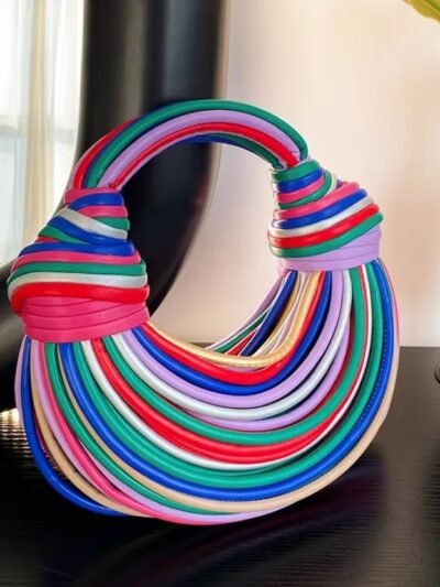 retro colorful bag lying on the black table