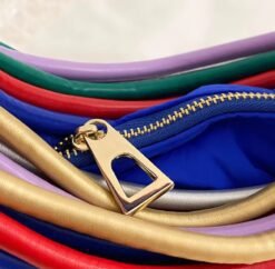 golden zipper of retro colorful bag zoomed in