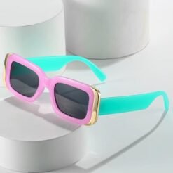 side view of retro colorful sunglasses on the white pillar