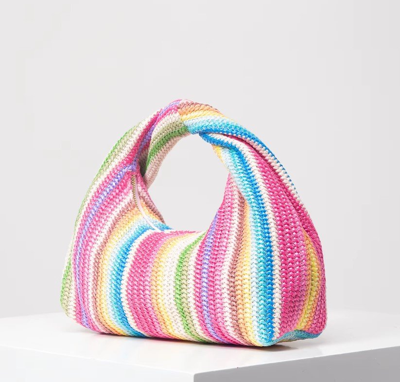 front and side view of vintage colorful bag on the white background