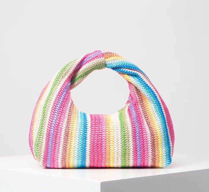 vintage colorful bag lying on a white surface