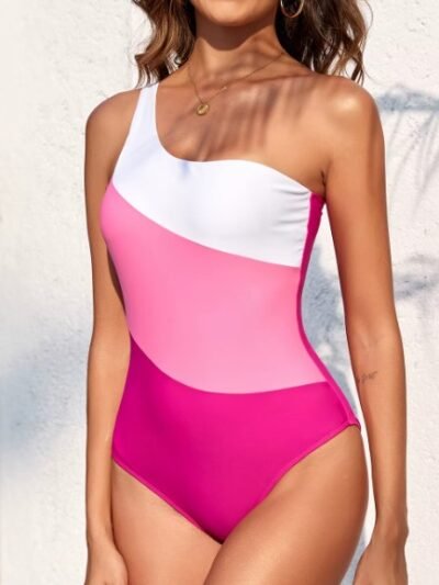 woman wearing asymmetric colorful one piece swimsuit
