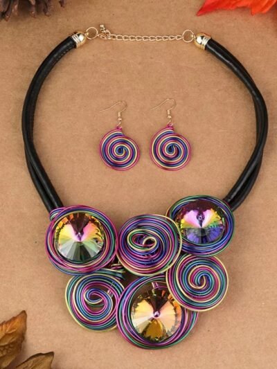 circle colorful jewelry set lying on a beige carpet