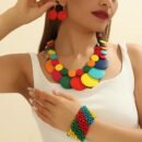 woman wearing colorful wooden jewelry set