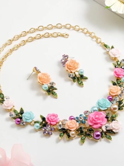 elegant colorful jewelry set arranged on the white surface