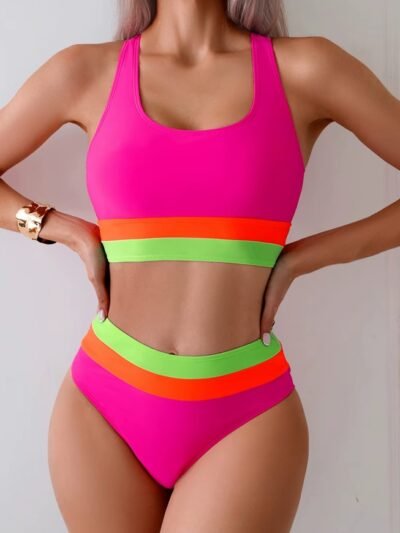 woman wearing neon bikini and a silver bracelet