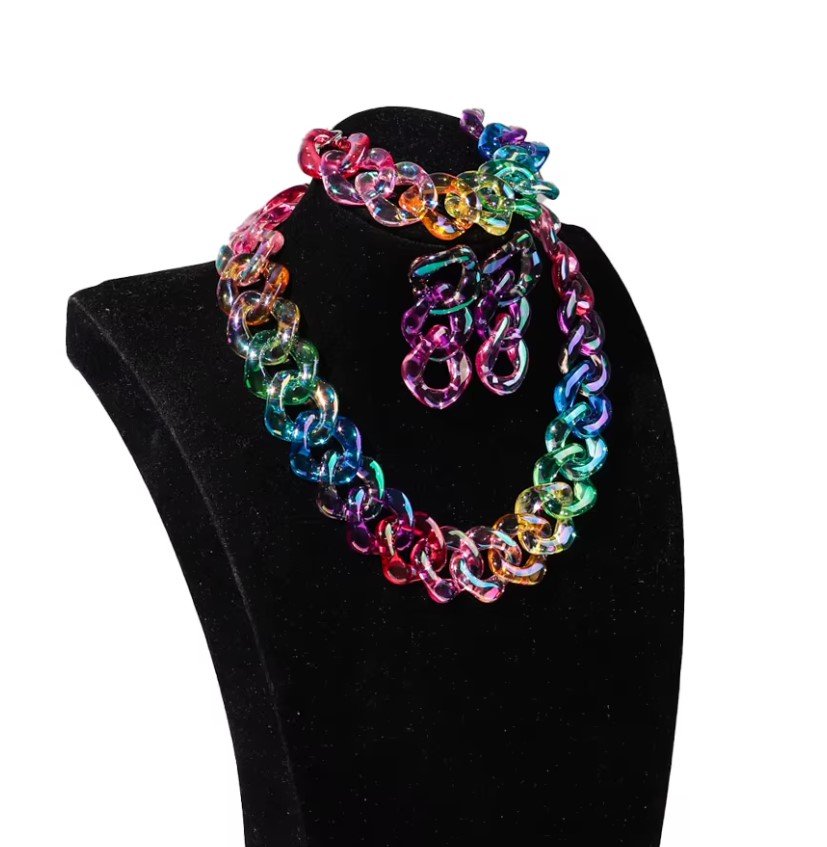 side view of statement jewelry set on a black jewelry mannequin