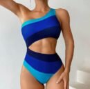 woman wearing striped swimsuit and circle earrings