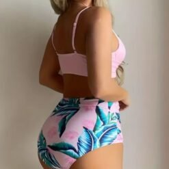 woman turned to her side wearing sweet colorful bikini