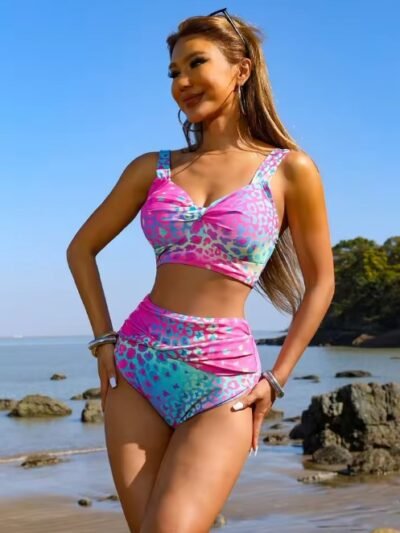 woman wearing vibrant multicolored bikini and sunglasses