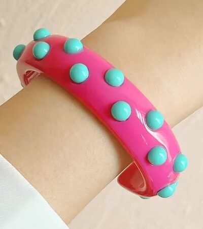 woman wearing pink variation of colorful cuff bracelet