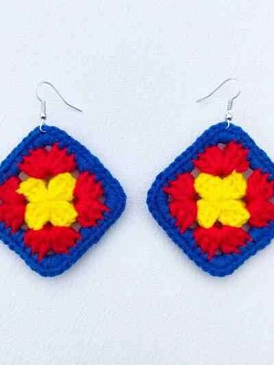 colorful crochet earrings on the white background