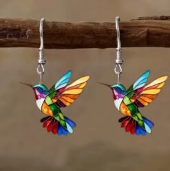 colorful earrings for women hung on a wooden branch