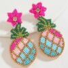 colorful pineapple earrings on the white background